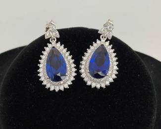 Silver pear cut blue stone earrings