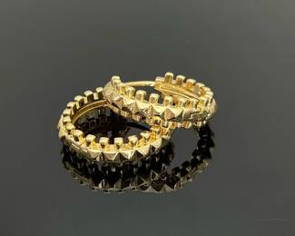 Gold tone huggie hoop earrings