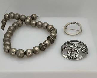 silvr pins and necklace