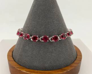 Sterling silver and red stone tennis bracelet