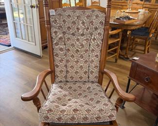 14. $50 Glider rocker light floral cushion