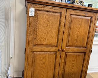 #34. $140 double door oak cabinet 43h,32w,19d