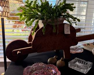 #63. $60 wooden wheel barrel decor