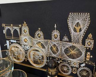 #28. $60 MCM retro wall decor train 16h,25w
