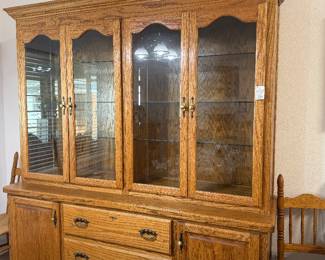 #20. $300 Lighted oak display cabinet