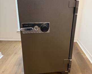 #66. $400 Bumil Safe with key and combination