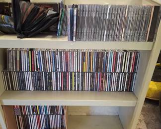 Lot 157: Collection of Music CDs and Disc Storage Cases