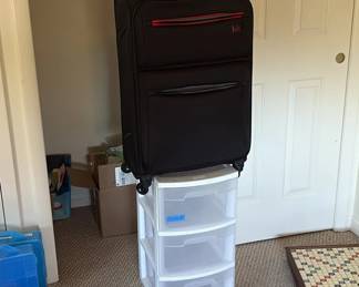 Lot 74: Rolling Suitcase and Storage Drawers