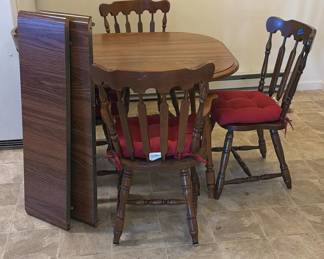 Lot 117: Wood Dining Table with Four Chairs and Seat Cushions