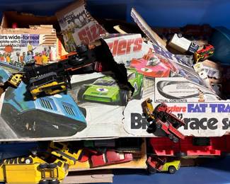 Several bins of Matchbox cars