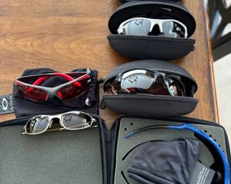 Lots of Oakley sunglasses