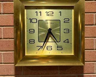 Brass framed wall clock