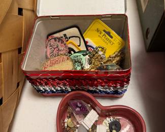 Tins and trinket dishes with costume jewelry