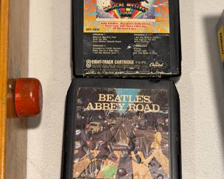Atari game cartridges and a Beatles Abbey Road case