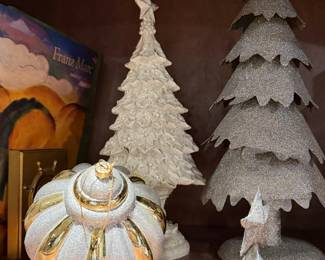 White ceramic Christmas trees and holiday decor
