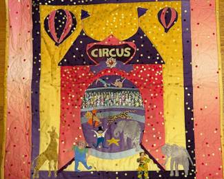 Handmade circus theme quilt with big top tent, balloons and animals