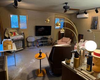 Finished basement den with seating and bar area