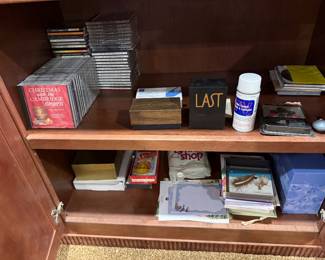 Shelf of compact discs and books