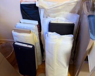 Rolls of batting and interfacing in storage