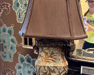 Table lamp with a pleated fabric shade