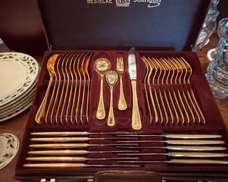 Boxed flatware service with gold tone handles