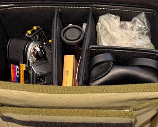 Camera bag with lenses, filters and accessories