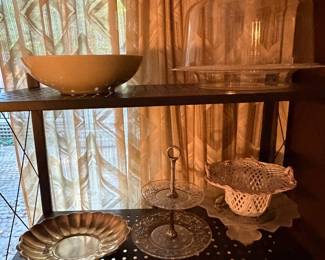 Shelf with a ceramic bowl in a window alcove