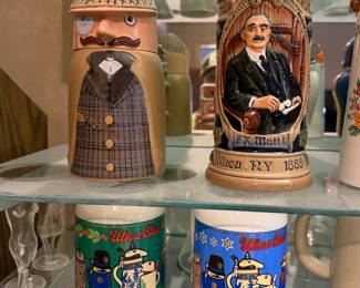 Character steins with figural head lids