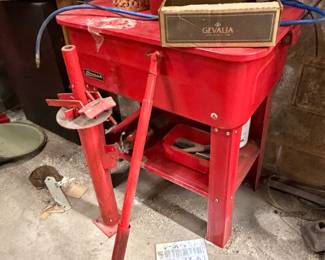 Red steel parts washer stand
