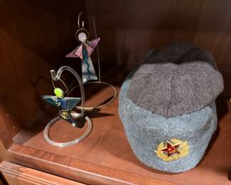 Art glass dragonfly ornament and a military style cap