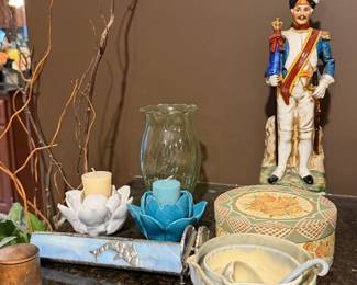 Lotus candle holders and a Colonial soldier figurine