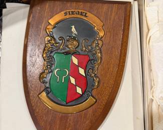 Carved wood heraldic crest plaque