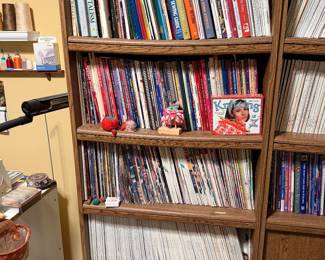 Bookcase of quilting books, magazines and decor
