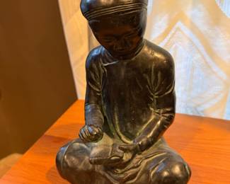 Bronze figure of a kneeling scholar