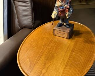 Painted bartender figurine on a round table