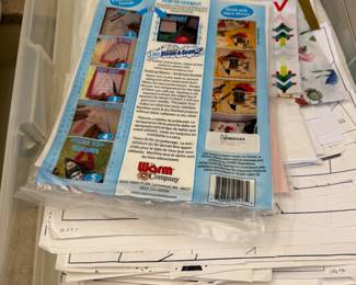 Stack of sewing patterns and pattern envelopes