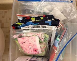 Bin of bagged fabric bundles and precut kits