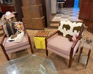 Upholstered chairs and storage boxes in a room corner