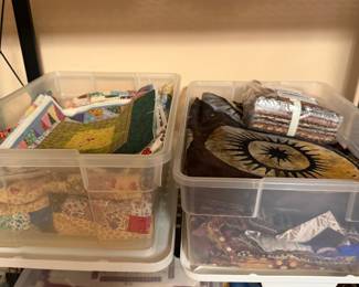 Bins of fabric scraps and strip sets