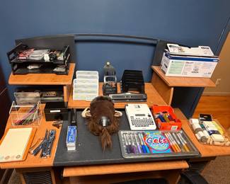 Desktop with office organizer, pens and supplies