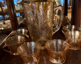 Marigold carnival glass pitcher and cups