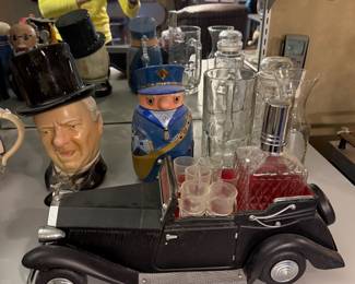 Toby style character mugs and a cocktail shaker set