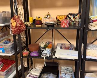 Shelf with handmade fabric baskets and sewing supplies