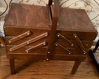 Accordion style wood sewing box on legs