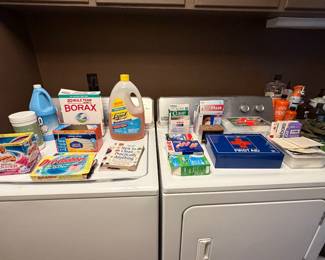 Cleaning supplies and household products on a dryer
