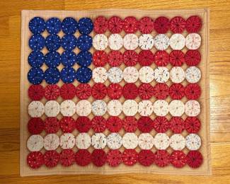 Handmade American flag quilt with yo yo stars and stripes