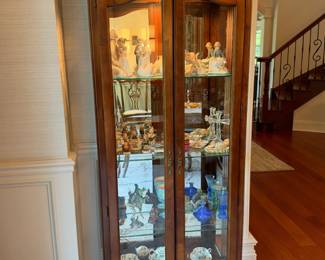 American of Martinsville glass curio cabinet. Cabinet only — all figurines, collectibles and other contents excluded.