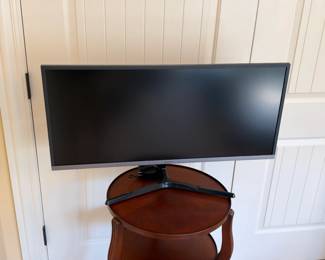 Samsung 34-inch ultrawide monitor S34J552WQN with stand. Display table excluded; see CTBids lot for testing and accessories.