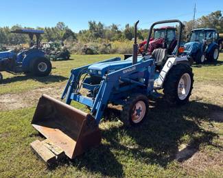 NEW HOLLAND 1720 W/ NEW HOLLAND 7308 LOADER