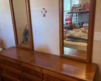 vintage 9-drawer wooden dresser with matching wall-mounted rectangular mirrors